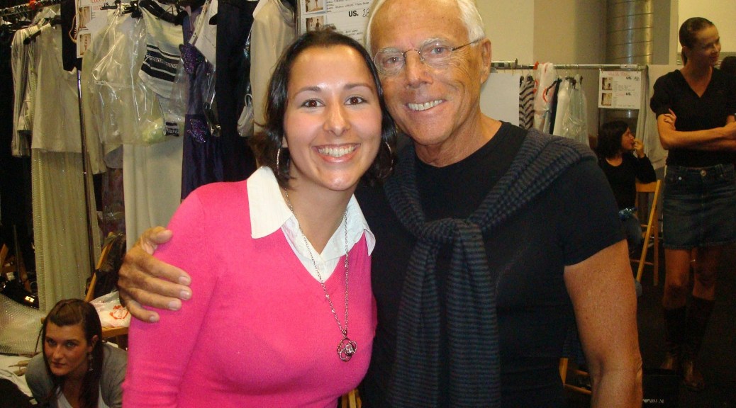 The author smiling beside Giorgio Armani backstage at Milan Fashion Week 2008. Armani is dressed in a black shirt, while the author stands beside him, beaming with excitement in a surreal, once-in-a-lifetime moment.